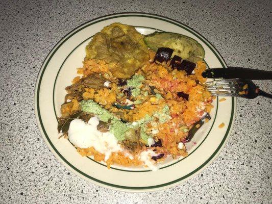 Fine Cuban cuisine   Shredded beef, yellow rice, tostones and avocado