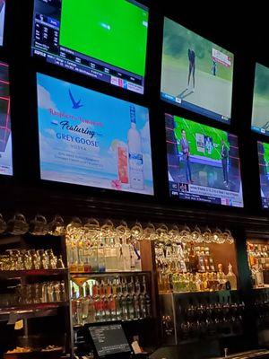 Many screens in this Sports Bar and one screen with Alcohol information.  9/15/2021