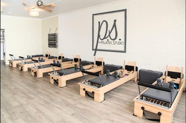 Pilates reformer instruction.