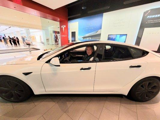 My buddy sitting on the new Tesla Plaid.