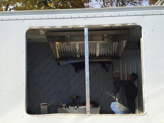 Hood being installed in the Haven Brothers 2 Food Truck