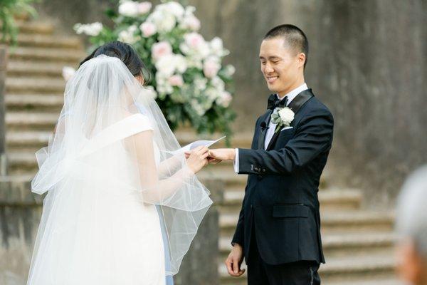 All ceremony florals (bouquets, boutonnieres, altar arrangements, aisle adornments, etc.) by UFE. Photo by Leigh Wolfe Photography.