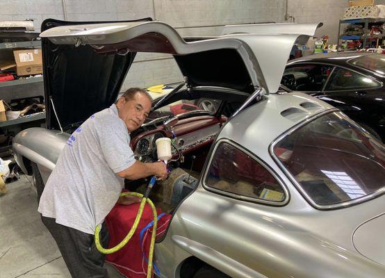 Noel giving a 300SL some love.