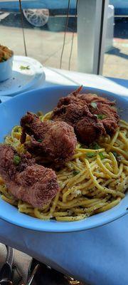 Chicken tenders with garlic noodles