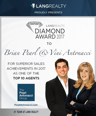 Brian Pearl and Vini Antonacci receive the Diamond Award from Lang Realty for the 2nd year in a row