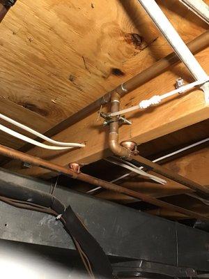 Pipe hangers on joists