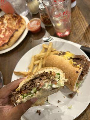 This cheesesteak and fries were DELICIOUS. Simple sandwich. BIG flavor!