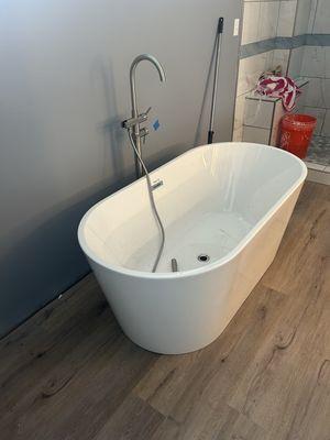 Brand new freestanding tub after we completed all the rough in work!