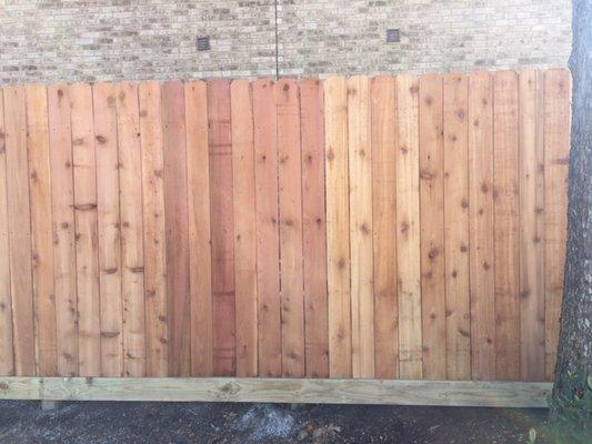 Busy day in Friendswood with the addition of this new Cedar picket privacy fence with rot board. TNS Fence, Galveston County