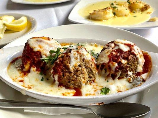 Meatballs were really tender and very good. Shrimp Paesano* in background