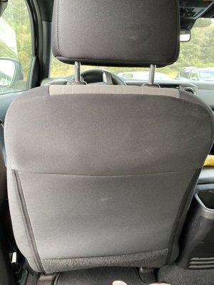 White stains AND dirt on the back of seats