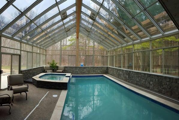 interior all glass cathedral roof pool enclosure