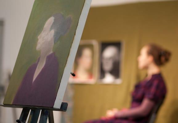 Model sitting in Art Class