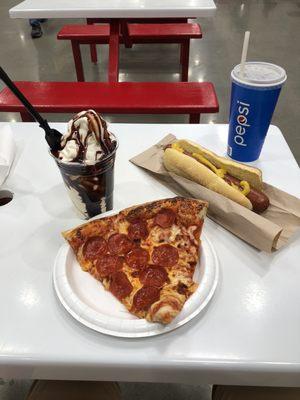 Pepperoni pizza slice, hot dog, fountain drink, and vanilla ice cream with chocolate sauce.