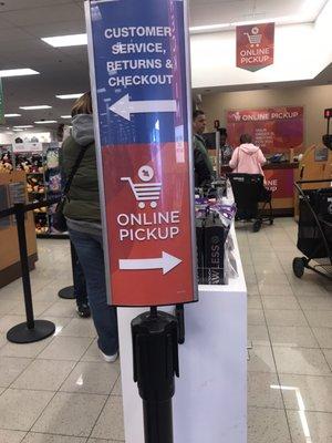 Kind of confusing ... but if you're picking up an online order, stay to the right of the sign and a cashier will get to you first