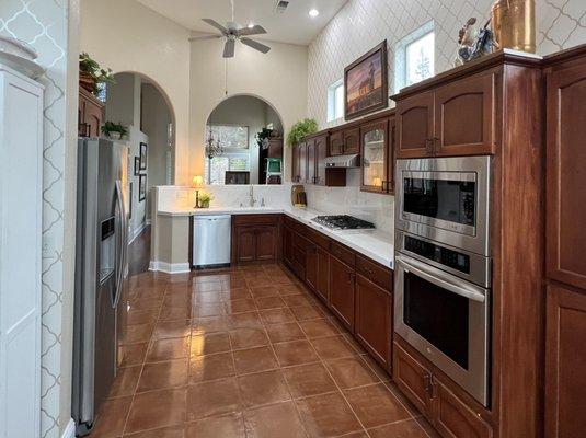 Kitchen Remodel tile floor and quartz countertops installed by Aztec Tile and Granite.