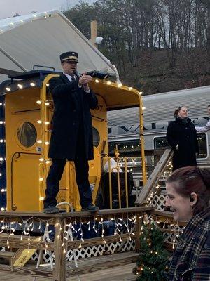 The conductor greeting everyone. He was fun!