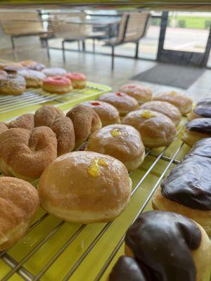 Filled donuts with lemon and raspberry.