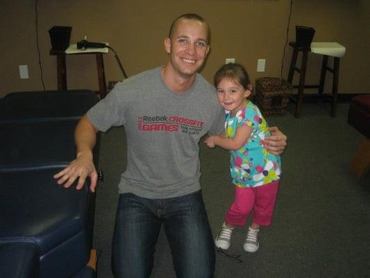 Dr Joe with one of our young happy patients.  We take care of kids to keep healthy and help prevent colds and ear infections.