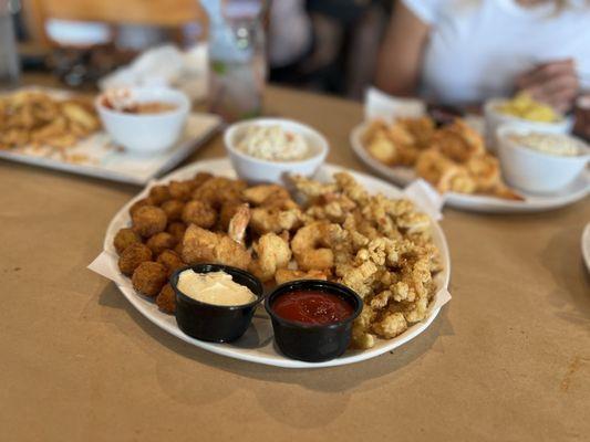 Scallops, clams, shrimp and fish with Cole slaw... yeah baby!