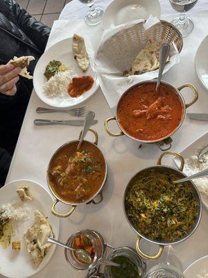 Lamb Vindaloo, butter chicken, palak paneer (spinach with cheese) and garlic naan