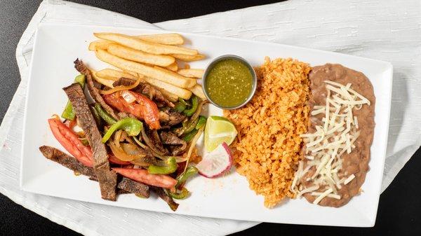 Asada Fajitas Asada grilled and diced with grilled onion and bell pepper and your choice of flour or corn tortillas