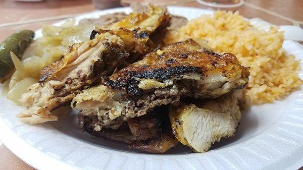 Half chicken plate with rice and refried beans.  Excellent!