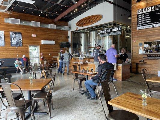 Big garage doors open to the left and large out door patio.