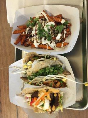 korean beef, tilapia, crispy eggplant, and tofu tacos with sweet potato fries with mole