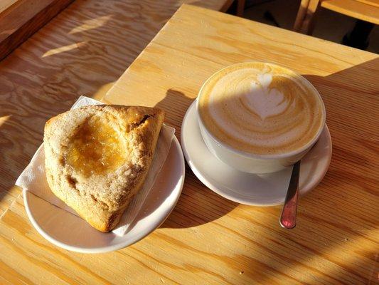 Latte soup and pastry of some sort