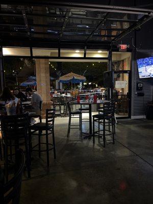 Garage doors open to patio