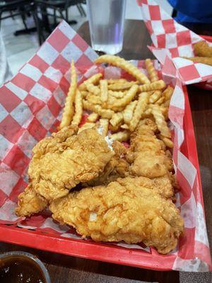 Hand-breaded chicken strips and fries