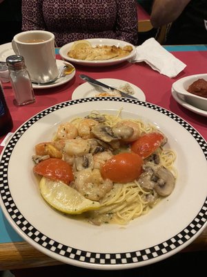 Shrimp Scampi! With Linguini!  Literally the best I've had!  Baked Haddock in the back, cooked perfectly!