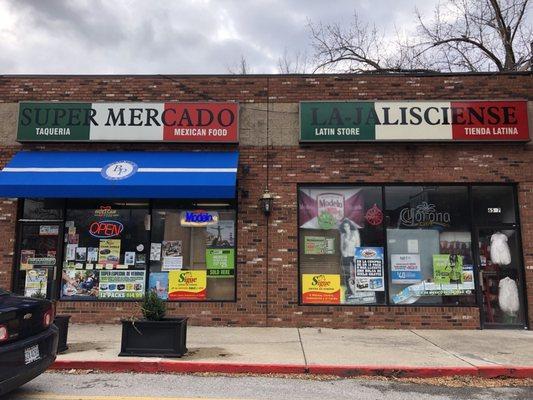 Small Mexican Restaurant on left side, Mexican grocery on the right have of the space.