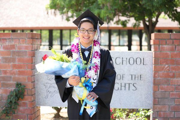 Graduation lei and flower bouquet