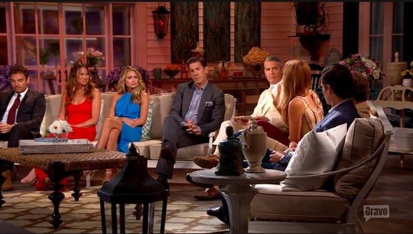 Cast of Southern Charm and host Andy Cohen with White House Living's cocktail table (front), plant stand (back right), and tr...