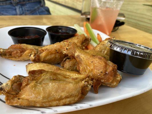 Naked wings with sauce on the side