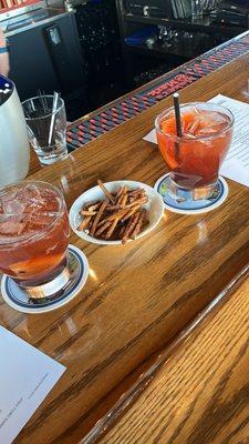 Two different types of old fashioneds + yummy pretzels