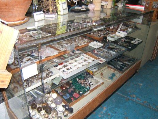 Crystal balls, pendants, rings, arrowheads, pendulums.