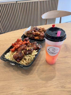 Two entree box with orange chicken and spicy chicken. Half chow mein and fried rice. With strawberry lemonade