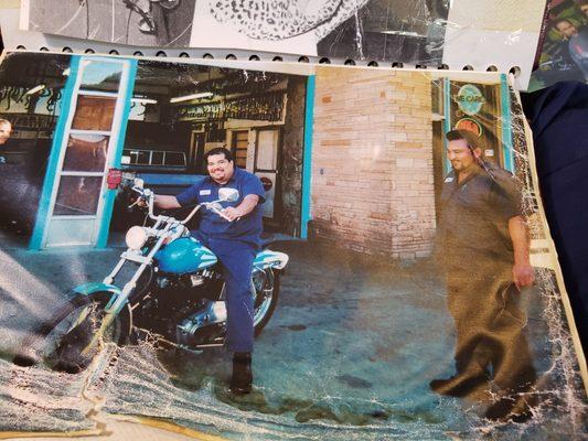 Art Ramirez on a Harley at his shop