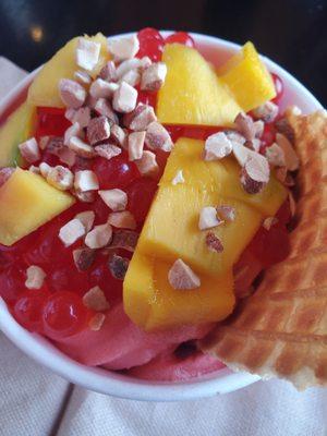 Strawberry sorbet with Strawberry Boba, almonds, and mangos. Yum !!!