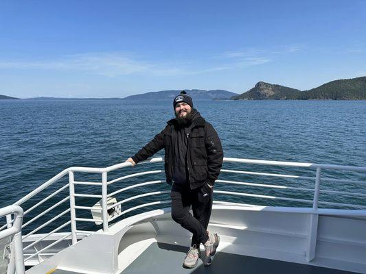 My husband on the Island Adventure's boat. Nice size boat. Had food & drinks, bathroom, and tons of room! It never felt crowded!