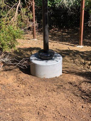 One of two 24" x 7' pour-in-place pole bases done by Manuel Raposo Construction. This one supporting a 4" x 16' aluminum hinged pole.