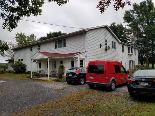 Milton, PA - 50 year GAF shingle roof in Patriot Red.  Including removal of old roof, new underlayment, flashing, ridge vents.