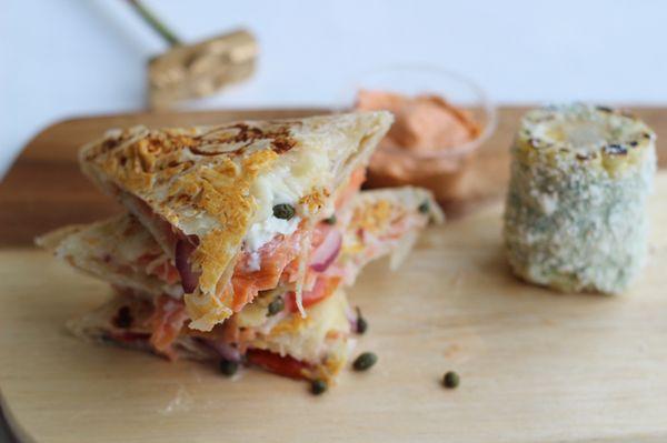 Smoked salmon quesadilla with a side of pesto roasted corn