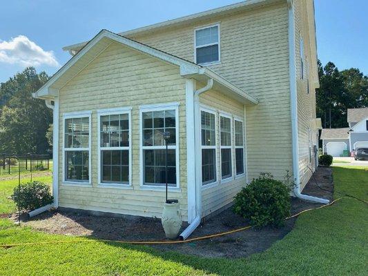 Vinyl siding cleaned with a soft wash