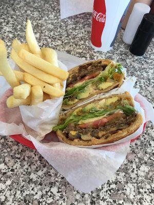 Golden Spike burger... has onion rings, bacon, cheese...