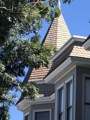 Wood shingle roof with scalloped detail