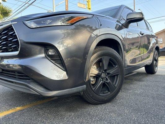 Stock rims painted black on 2021 Toyota Highlander Hybrid